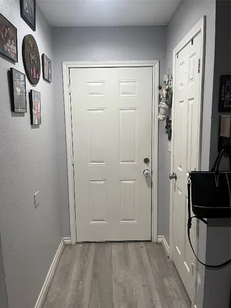 a view of a storage & utility room with a sink