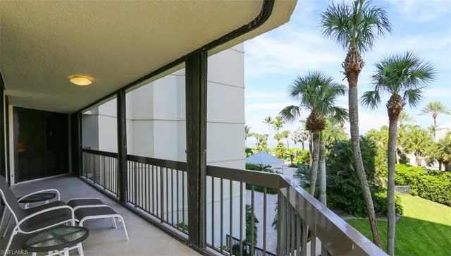 a view of balcony with a potted plant