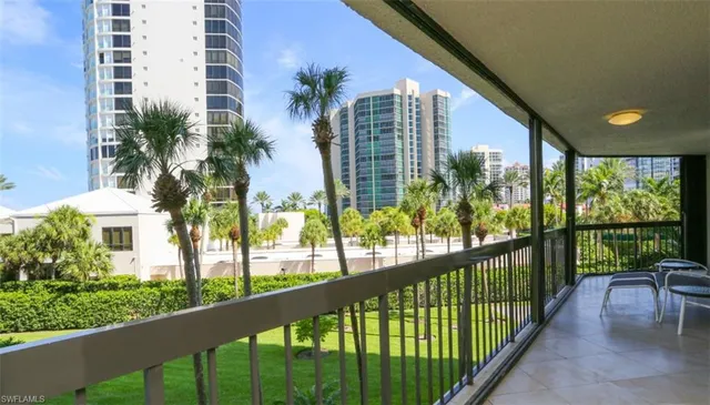 a view of balcony with furniture