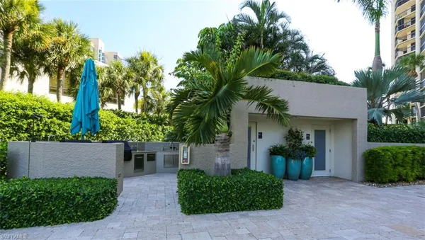 front view of a house with a garden