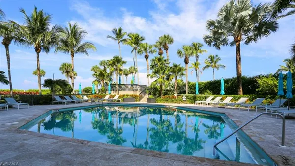 a view of swimming pool with a patio