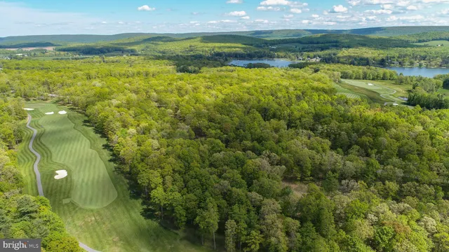 a view of an ocean and a yard