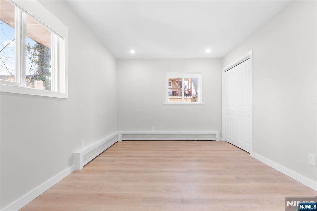 539 Undercliff Avenue, Unit 4 Edgewater, NJ 07020 - Photo 12 of 15 a view of empty room with windows