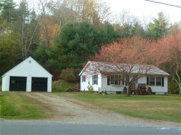 195 West Gill Road Gill, MA 01354 - Photo 3 of 19 a front view of a house with a garden