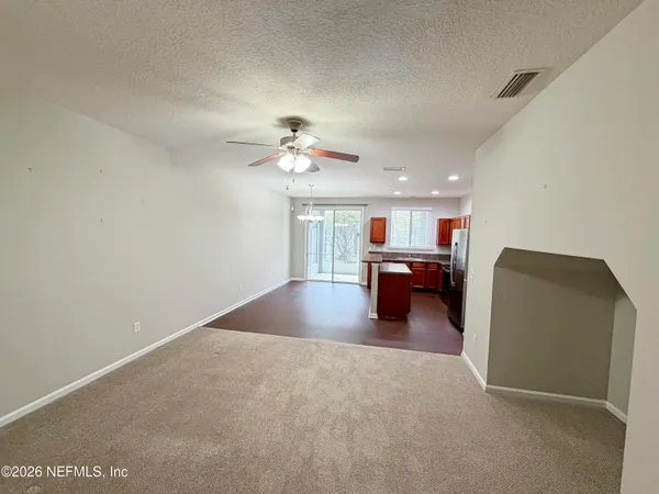 a view of a livingroom and a garage