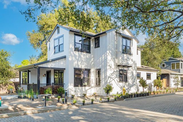 front view of a house with a yard
