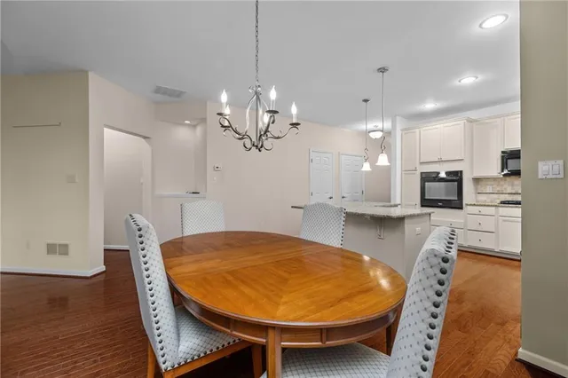 a view of a dining room with furniture