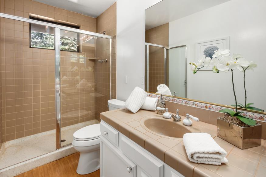 56 Big Tree Road Woodside, CA 94062 - Photo 11 of 31 a bathroom with a sink a toilet and shower