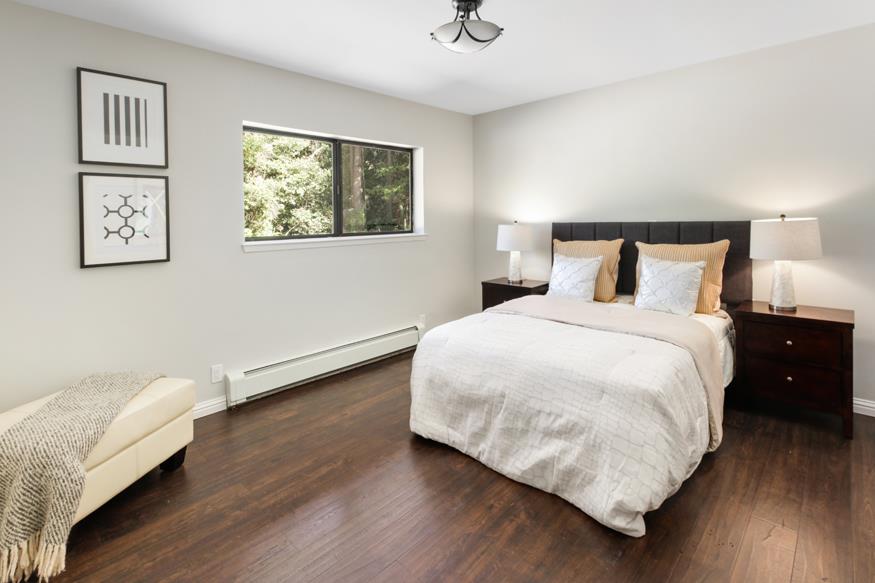 56 Big Tree Road Woodside, CA 94062 - Photo 13 of 31 a bedroom with a bed and a night stand