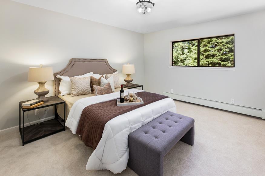 56 Big Tree Road Woodside, CA 94062 - Photo 14 of 31 a bedroom with a bed and a night stand