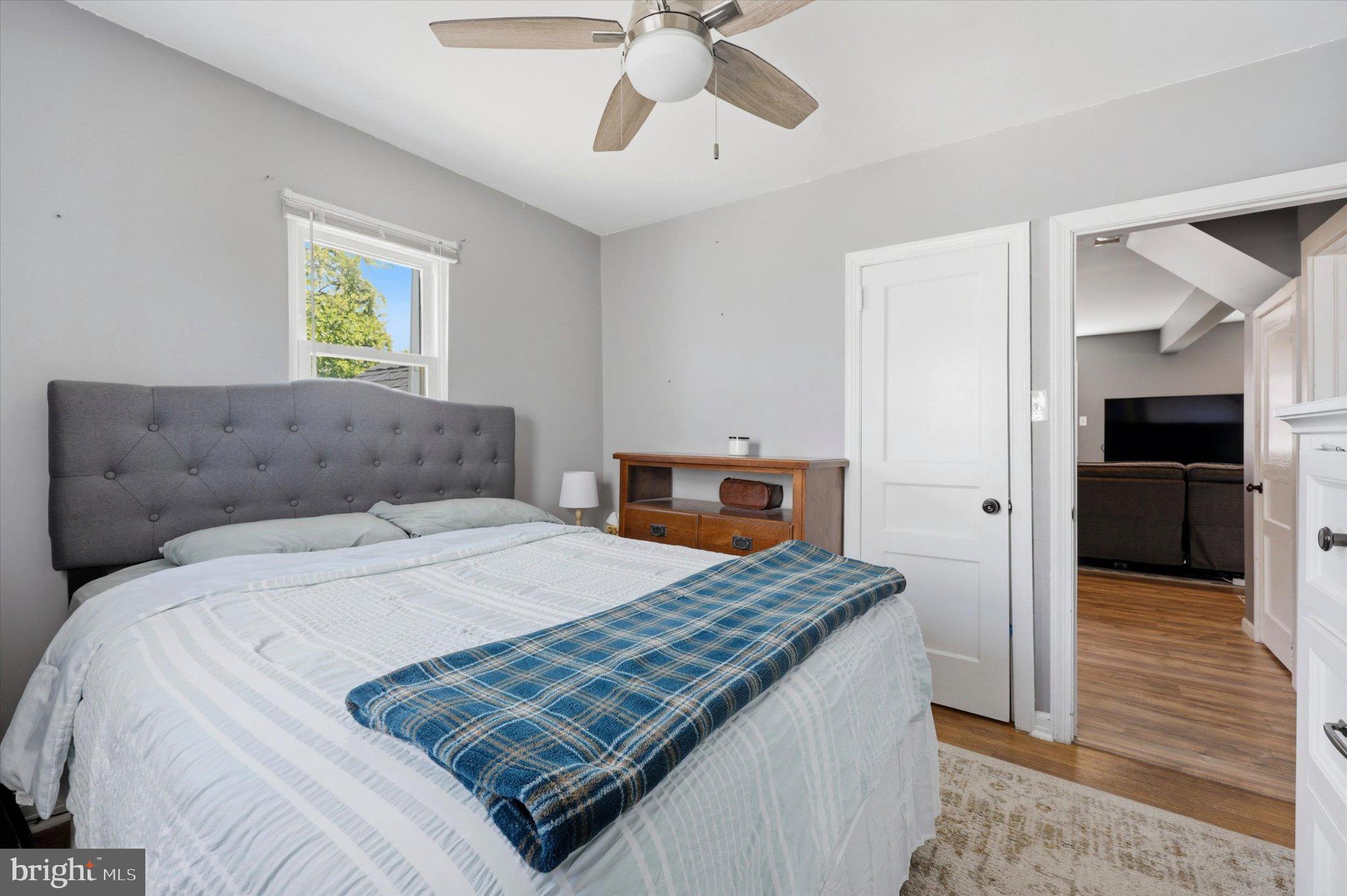 100 5th Street Brooklawn, NJ 08030 - Photo 12 of 23 Cozy bedroom with natural light.