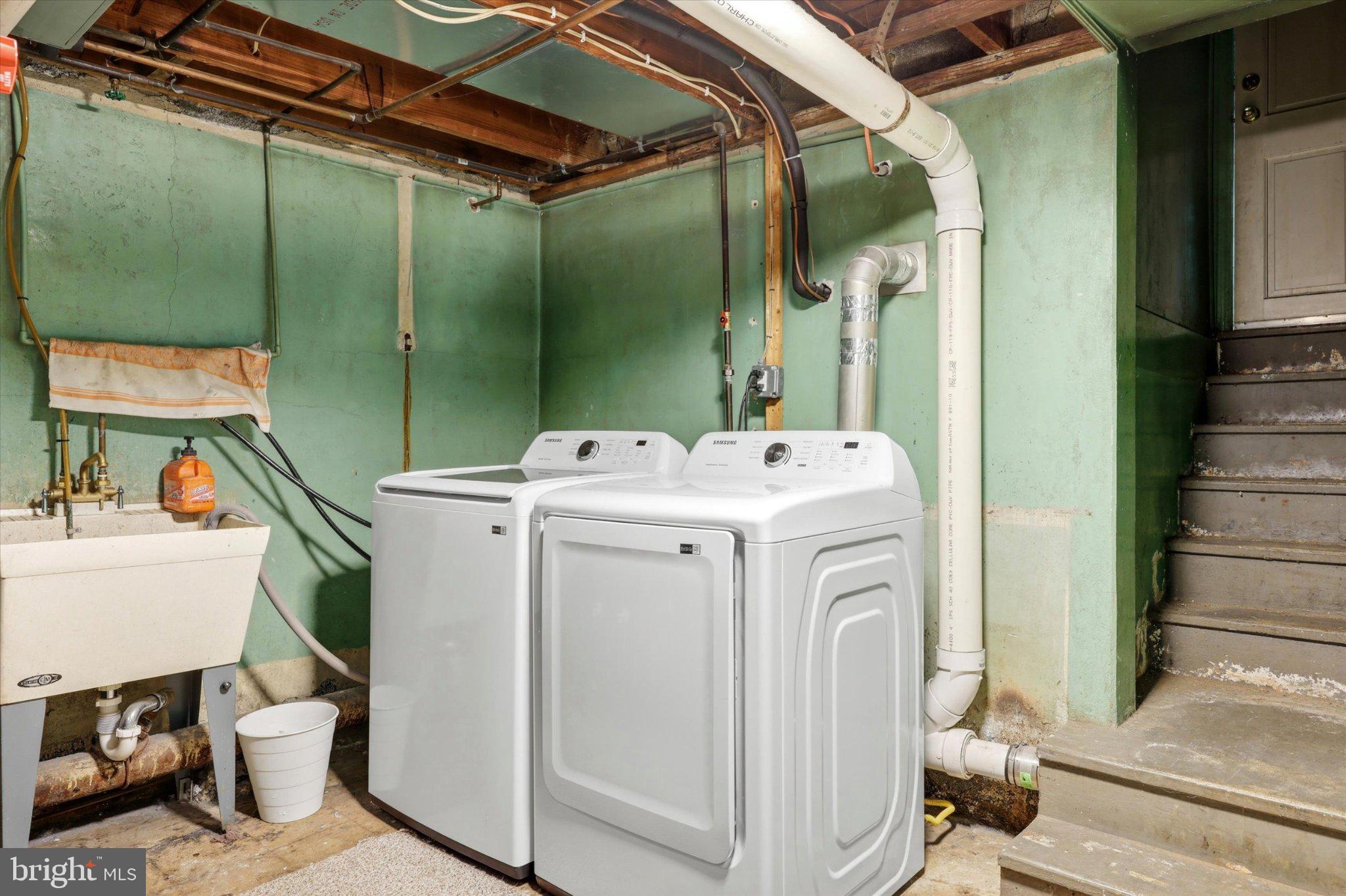 100 5th Street Brooklawn, NJ 08030 - Photo 21 of 23 Functional laundry space in a basement.