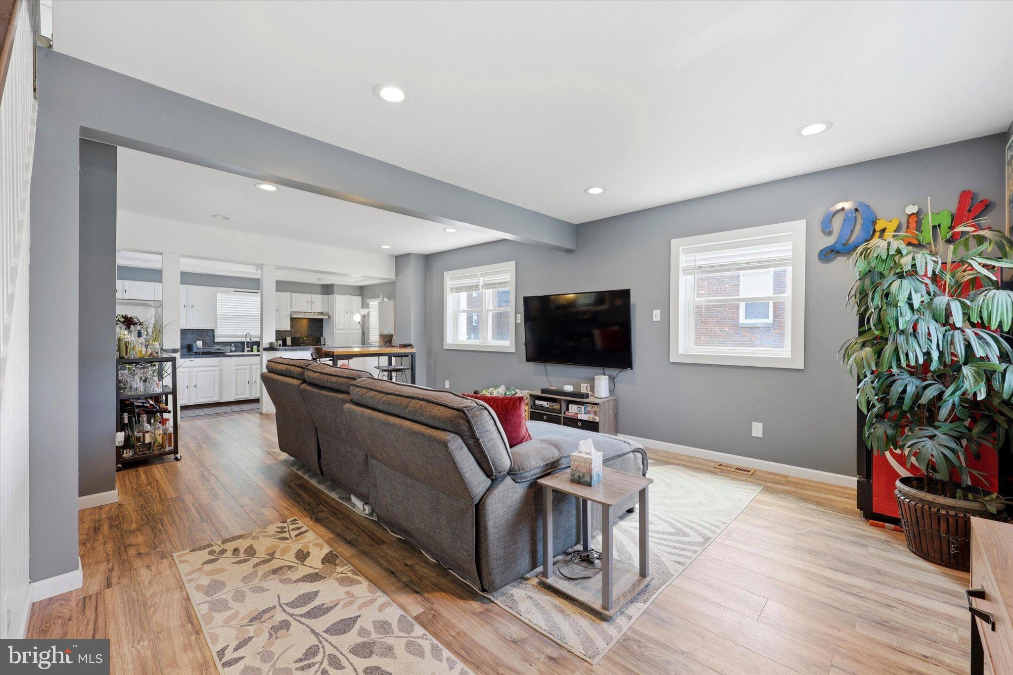 100 5th Street Brooklawn, NJ 08030 - Photo 3 of 23 Modern living space with vibrant accents.