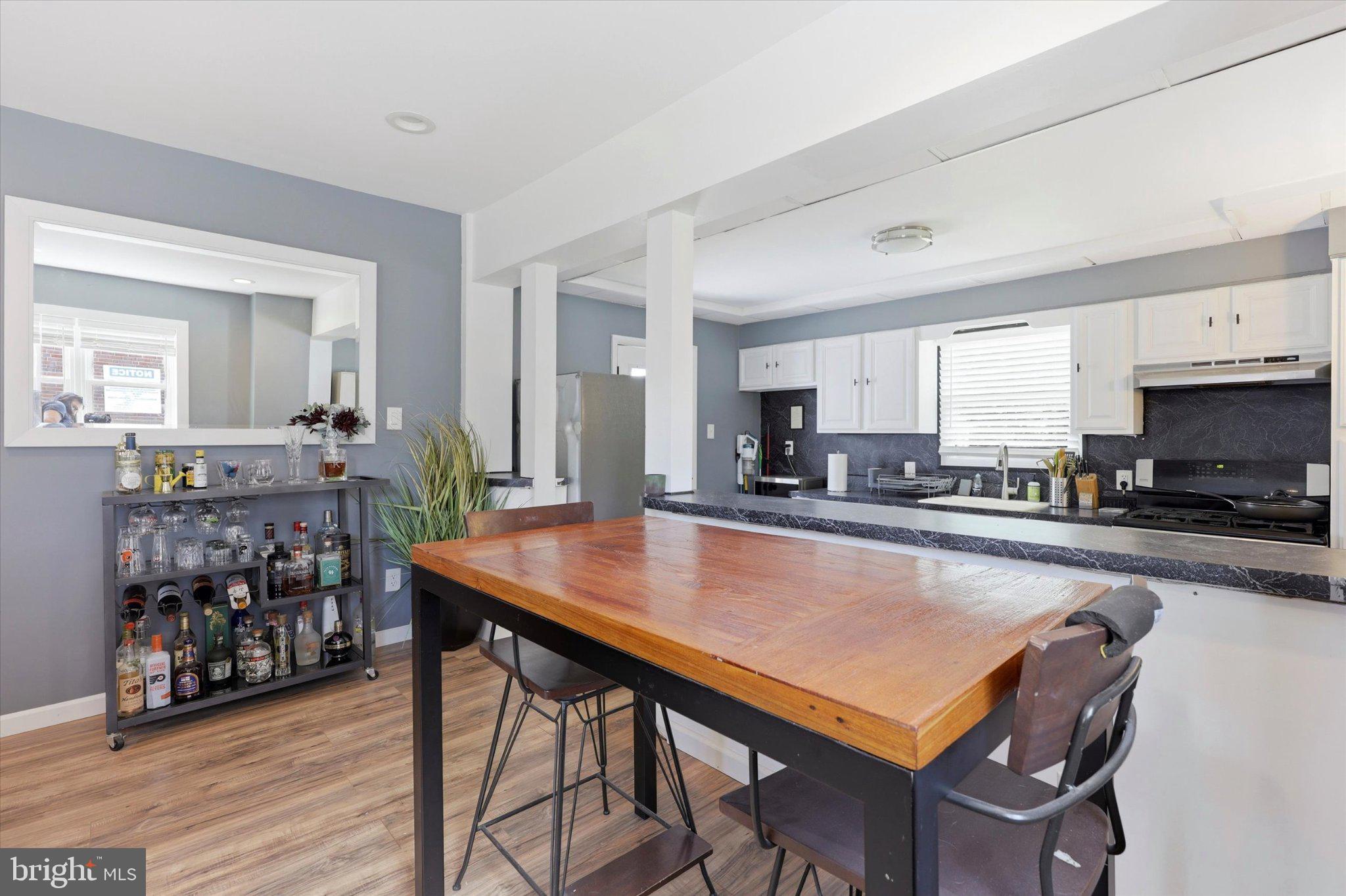 100 5th Street Brooklawn, NJ 08030 - Photo 5 of 23 Modern kitchen with stylish dining area.