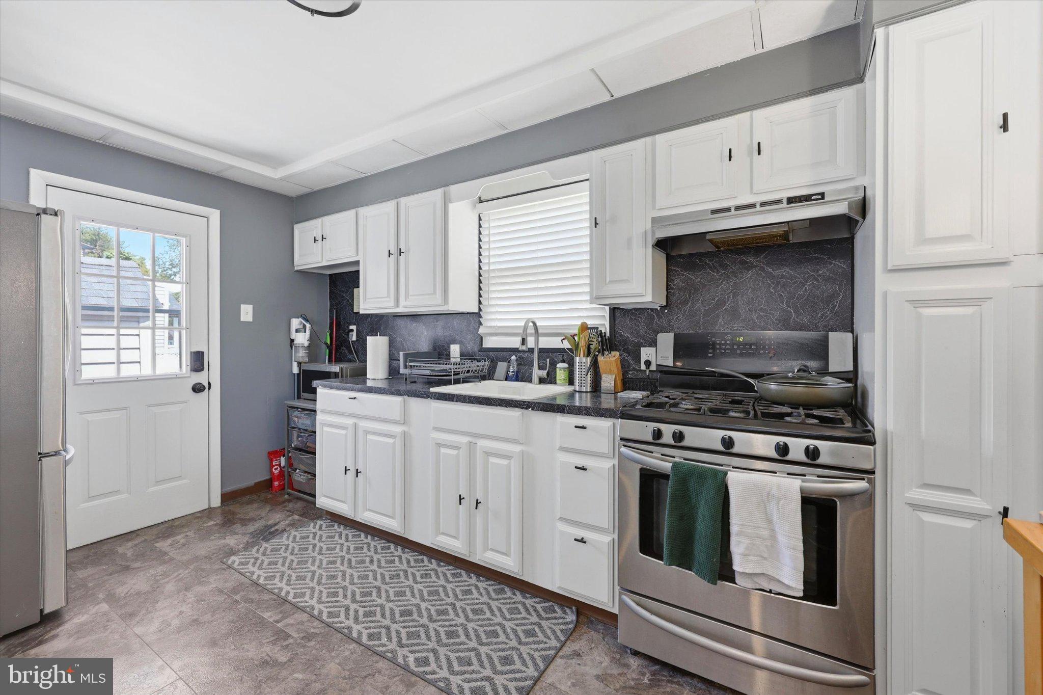 100 5th Street Brooklawn, NJ 08030 - Photo 9 of 23 Modern kitchen with sleek finishes.