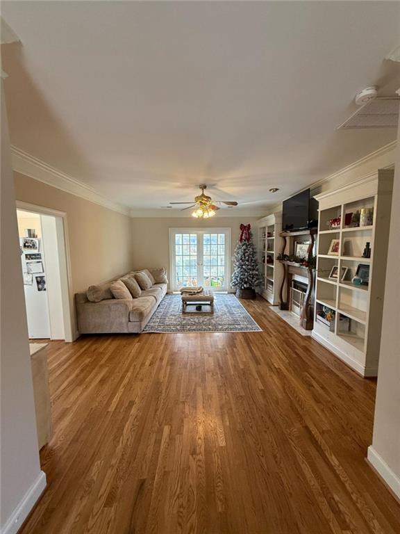 11 Stonegable Drive Northwest Rome, GA 30165 - Photo 5 of 27 a living room with furniture and a wooden floor
