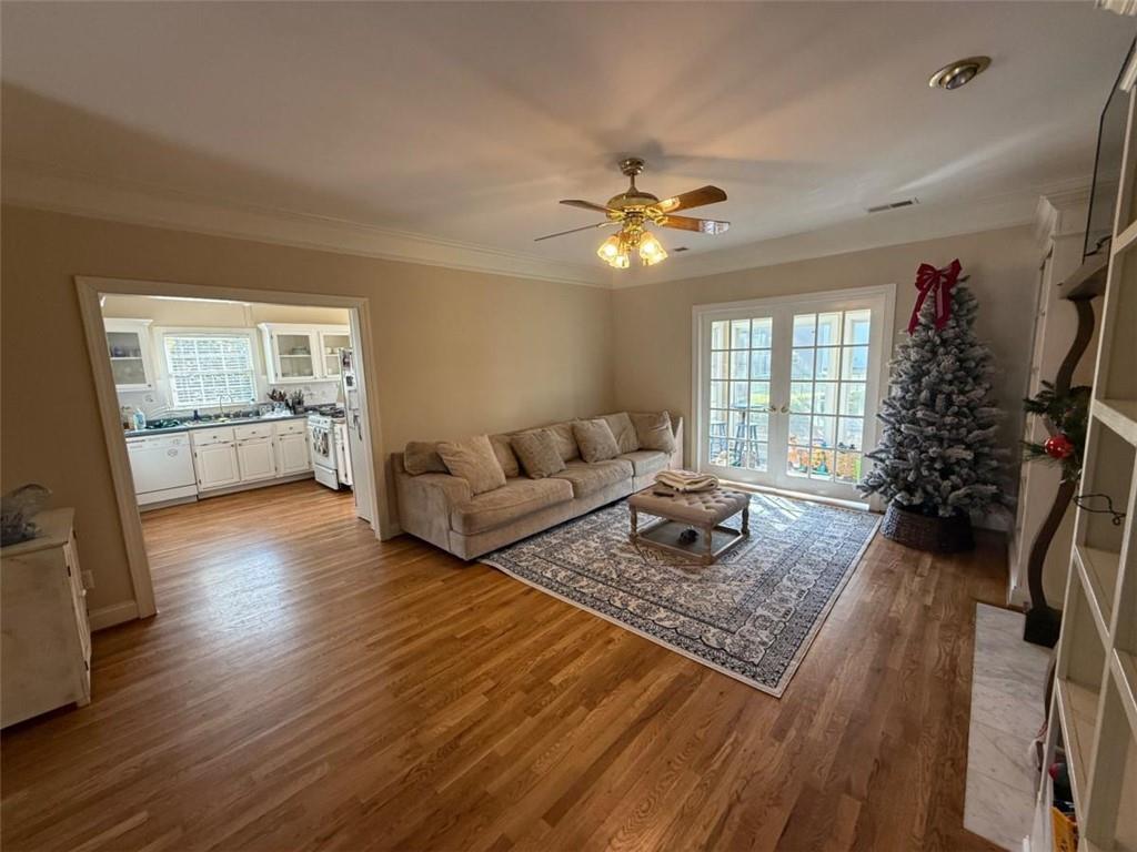 11 Stonegable Drive Northwest Rome, GA 30165 - Photo 8 of 27 a living room with furniture and a wooden floor
