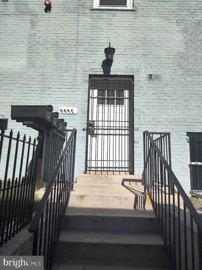 4230 6th Street Southeast, Unit 1 Washington, DC 20032 - Photo 21 of 25 a view of a balcony with wooden floor