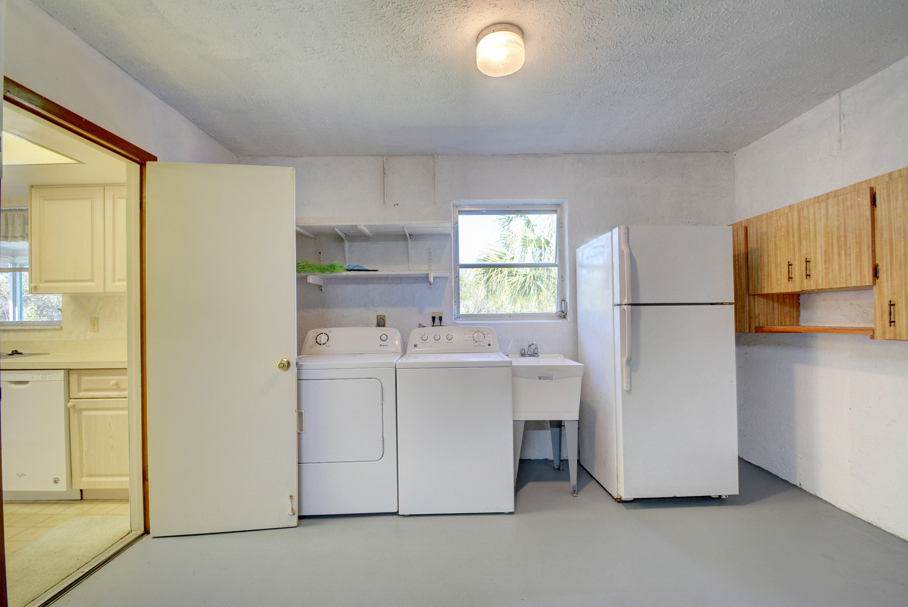 785 Southwest Salerno Road Stuart, FL 34997 - Photo 30 of 51 Garage/laundry area
