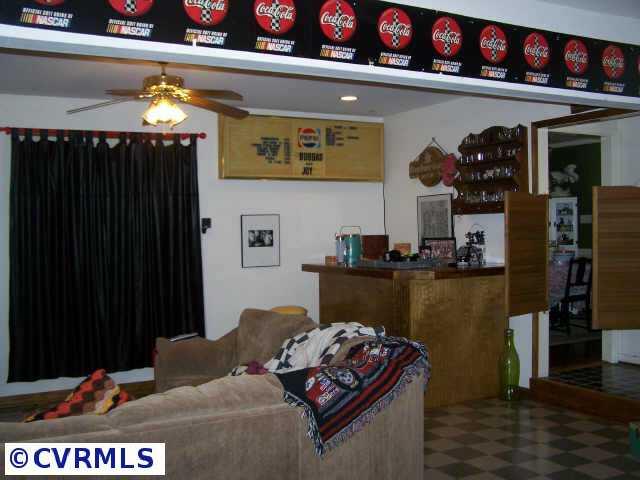 7931 Woodpecker Road Chesterfield, VA 23838 - Photo 3 of 6 Other - Entertainment room with bar area