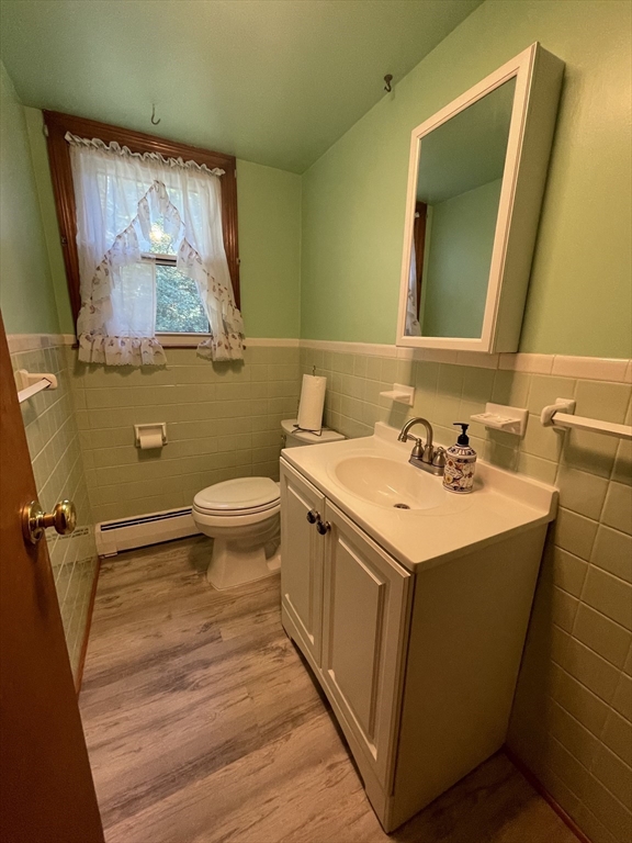 7 Albert Street Billerica, MA 01821 - Photo 12 of 33 a bathroom with a sink and a mirror