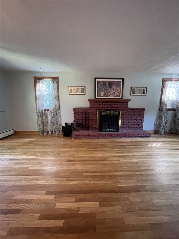 7 Albert Street Billerica, MA 01821 - Photo 15 of 33 a living room with furniture and a flat screen tv