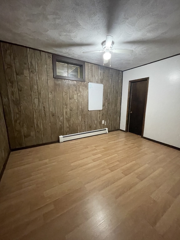 7 Albert Street Billerica, MA 01821 - Photo 29 of 33 a view of an empty room with a chandelier