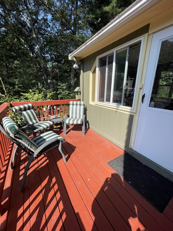 7 Albert Street Billerica, MA 01821 - Photo 6 of 33 a view of a roof deck with wooden floor and fence