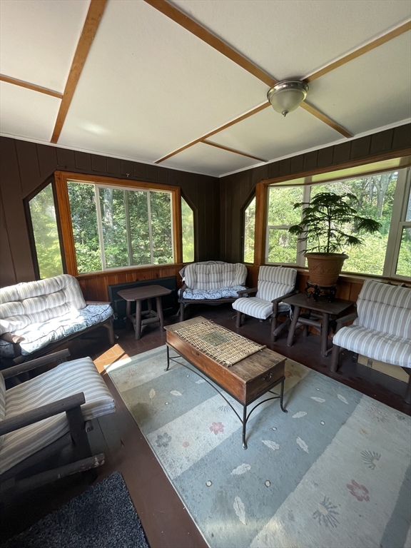 7 Albert Street Billerica, MA 01821 - Photo 7 of 33 a living room with furniture and a large window