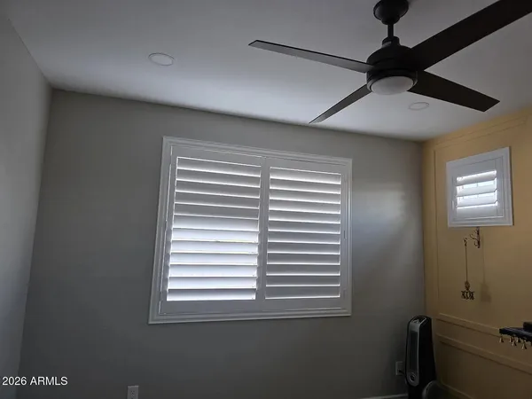 a view of a room that has a window in it