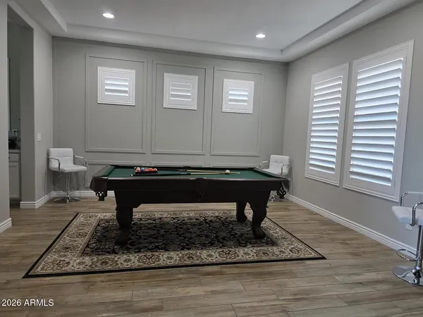 a living room with a couch and a rug