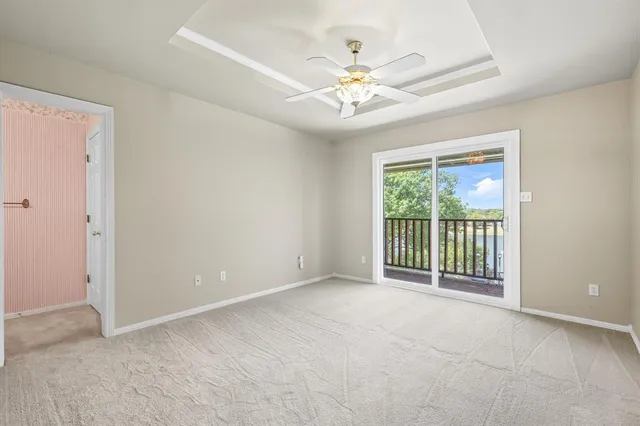 a view of a swimming pool with a lounge chair