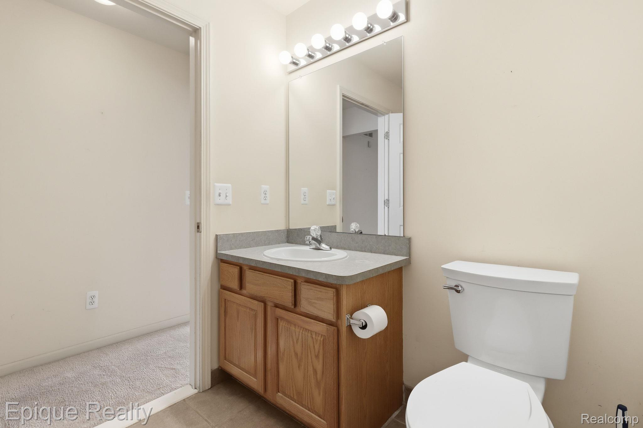 321 Cherry Grove Road Canton, MI 48188 - Photo 22 of 22 Half bathroom featuring toilet and vanity