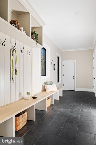 a bathroom with a toilet sink and shower