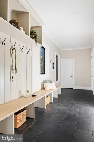 a bathroom with a toilet sink and shower