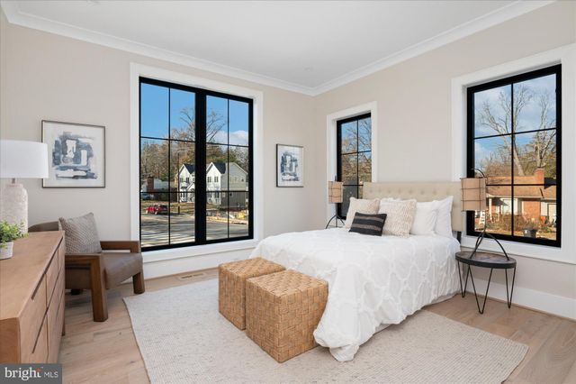 a living room with furniture and windows