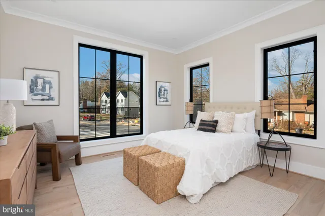 a living room with furniture and windows