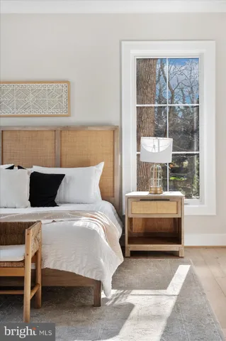 a bathroom with a double vanity sink a mirror and shower