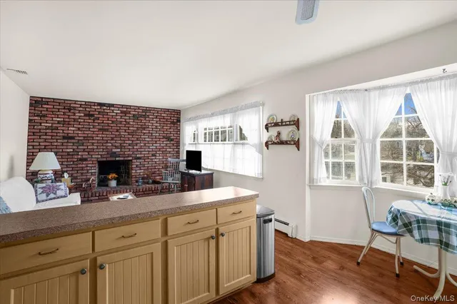 a lake view with large trees