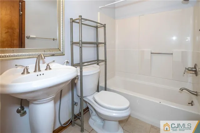 a kitchen with stainless steel appliances a refrigerator sink and stove