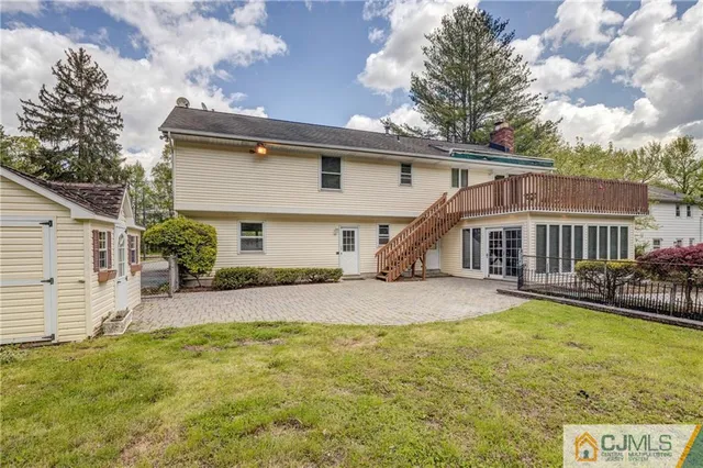 a swimming pool with outdoor seating