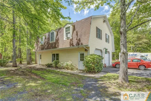 a kitchen with cabinets and white appliances