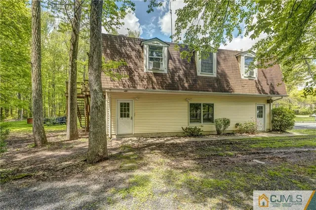 a room with a sink and cabinets