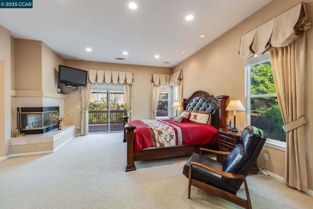 a view of a workspace with furniture and a workspace