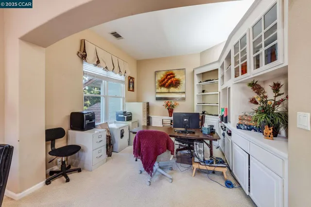 a bathroom with a double vanity sink a mirror and a shower