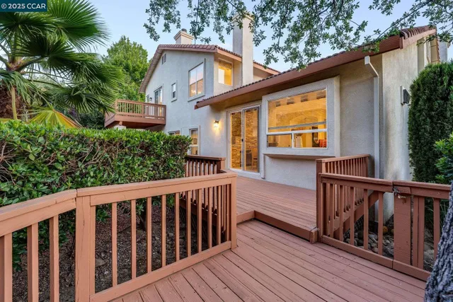 a view of a bench in the backyard
