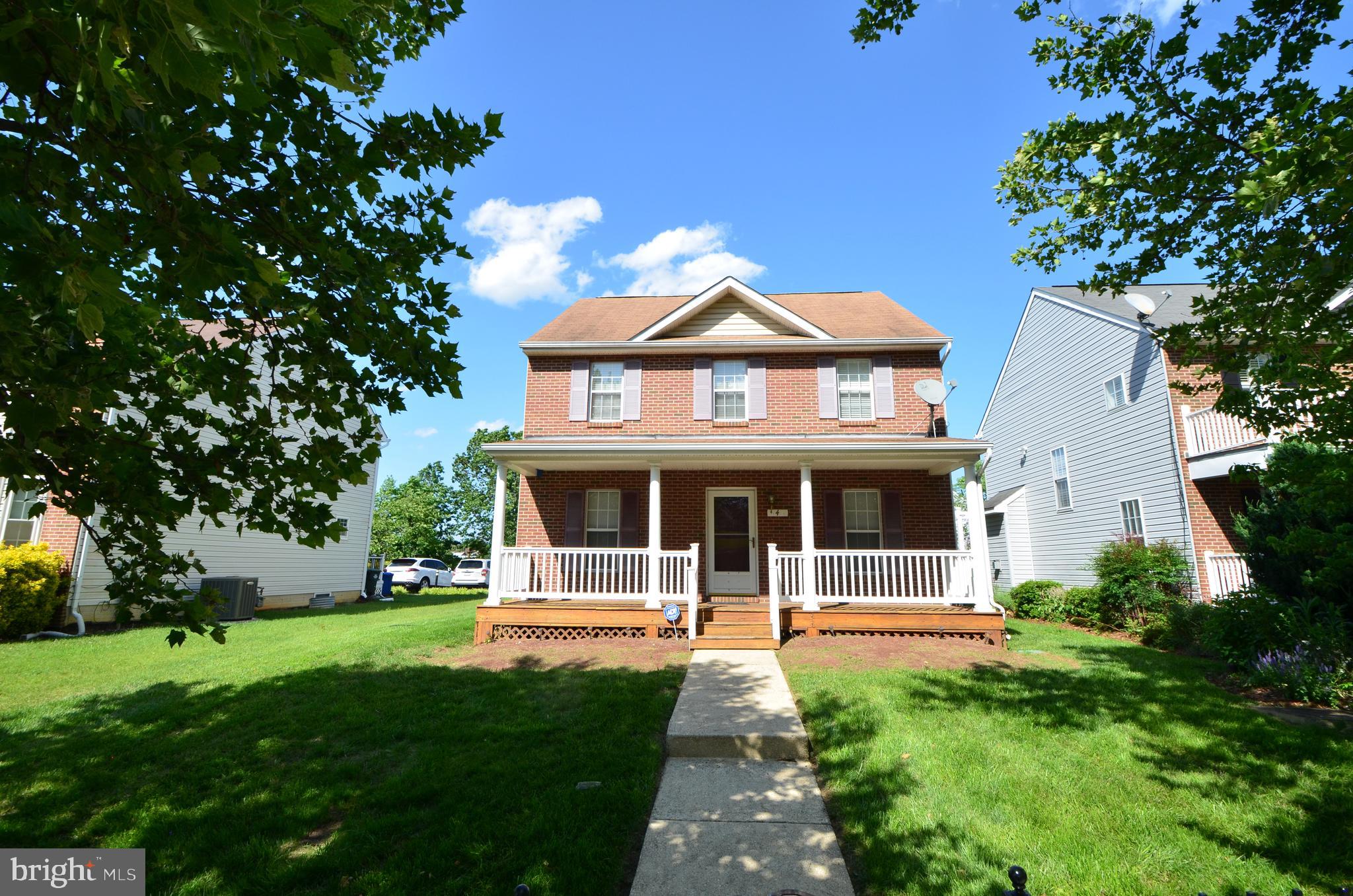 4 Ridge Road Southeast Washington, DC 20019 - Photo 1 of 47 a front view of a house with garden