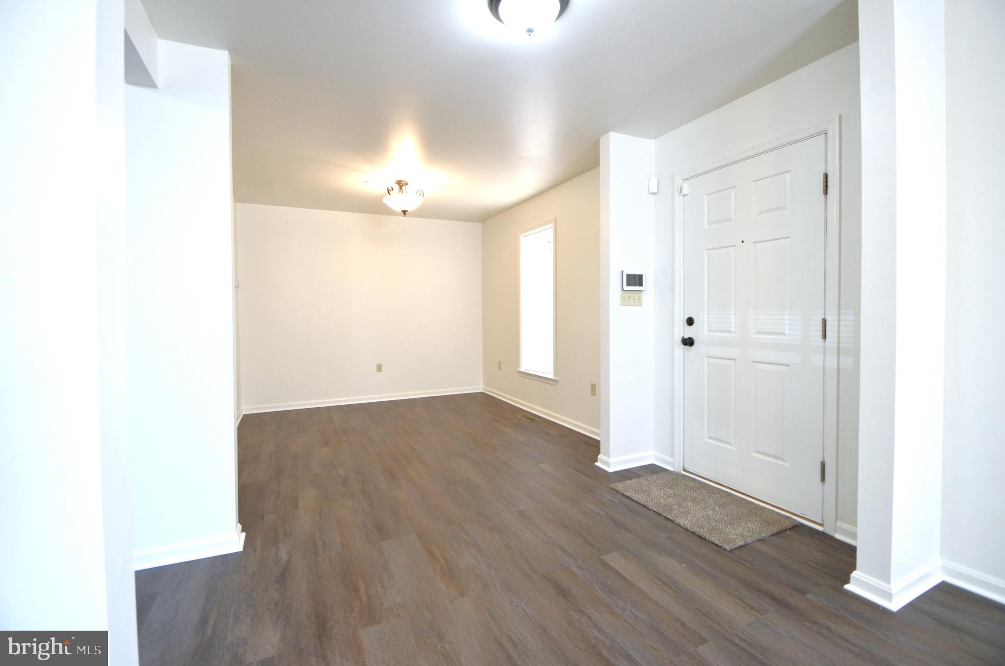 4 Ridge Road Southeast Washington, DC 20019 - Photo 18 of 47 a view of a room with wooden floor