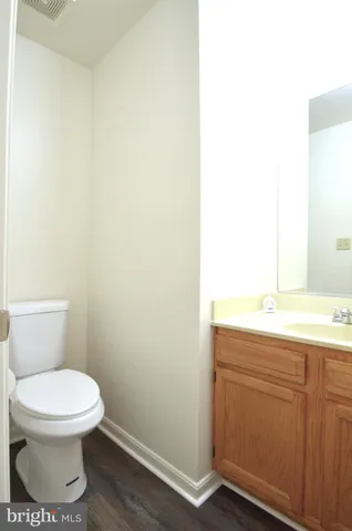 a bathroom with a toilet and a sink
