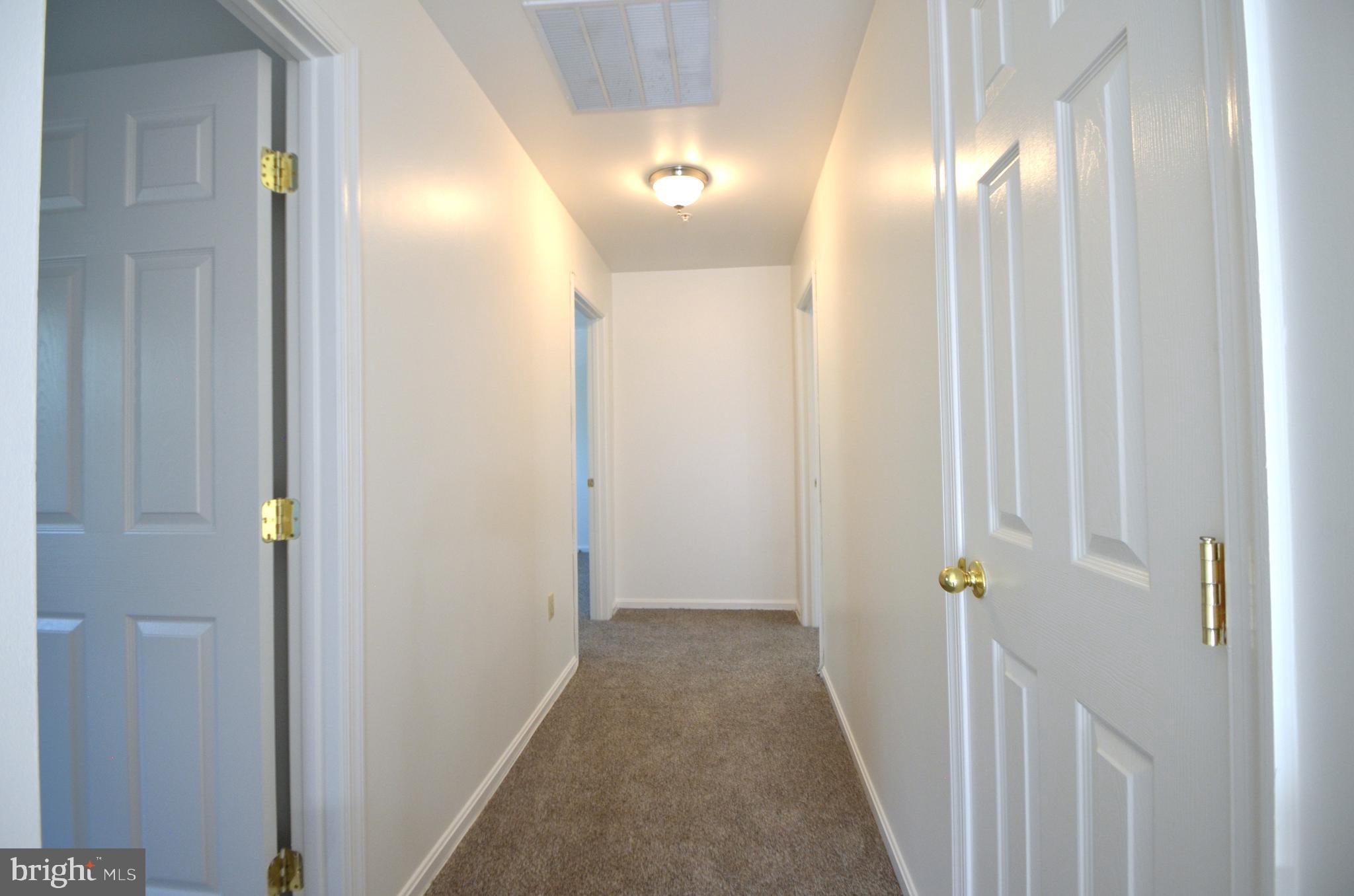 4 Ridge Road Southeast Washington, DC 20019 - Photo 23 of 47 a view of a hallway with wooden floor